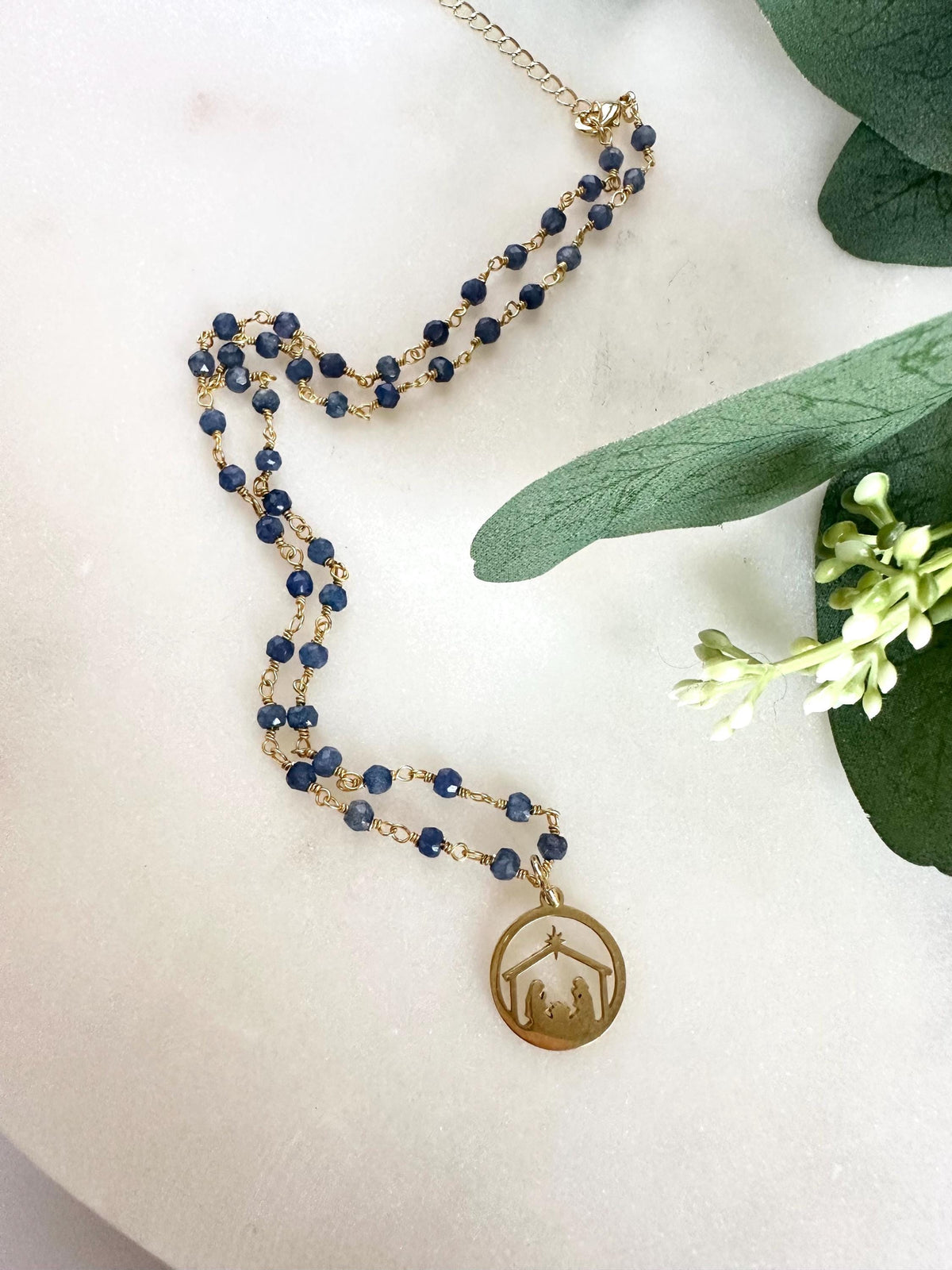 Blue Sapphire Nativity Necklace: Gold Plated Religious Jewelry
